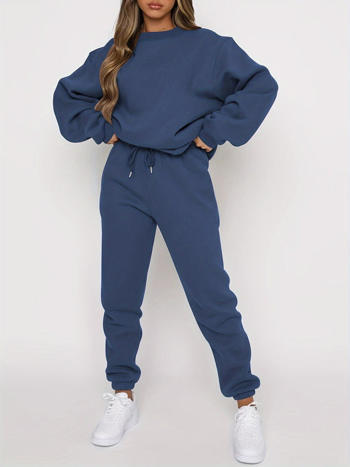 LuroLondon The Simple Two-Piece set featuring a sleek, minimalist design with matching top and skirt in neutral fabric.