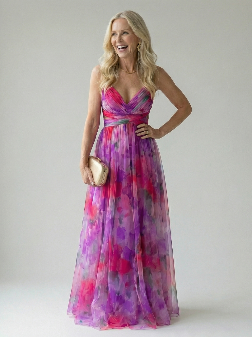 Veda Bremen Isel soft wrap maxi dress in light fabric, featuring a flowing silhouette and gentle draping, displayed on a mannequin.