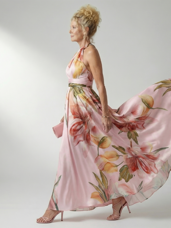 Veda Bremen Amiel lightweight maxi dress with colorful floral print, flowing fabric, and sleeveless design.