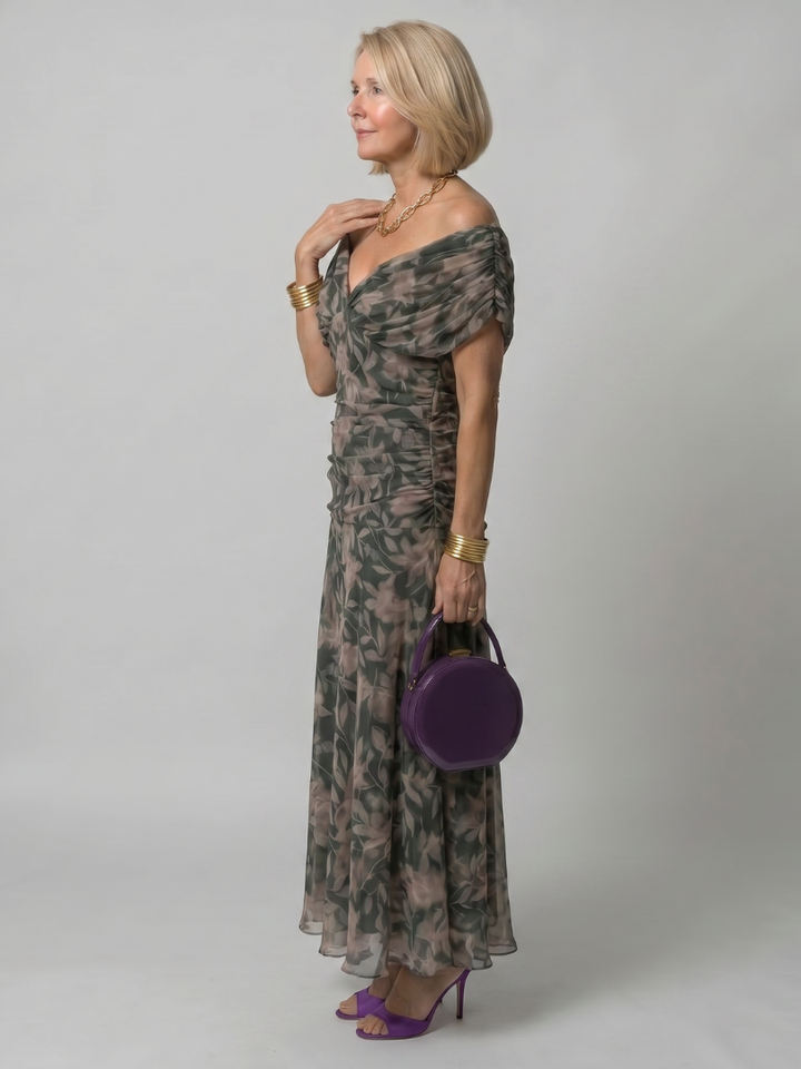 Veda Bremen Calen off-shoulder midi dress with flowing silhouette, showcasing the elegant, lightweight fabric design.