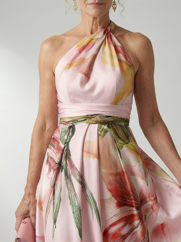 Veda Bremen Amiel lightweight maxi dress with colorful floral print, flowing fabric, and sleeveless design perfect for summer wear.