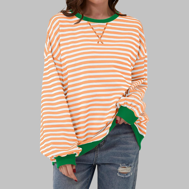 Veda Bremen LUKA striped long sleeve top, soft and lightweight spring layer, shown on a hanger with a relaxed fit and soft fabric.