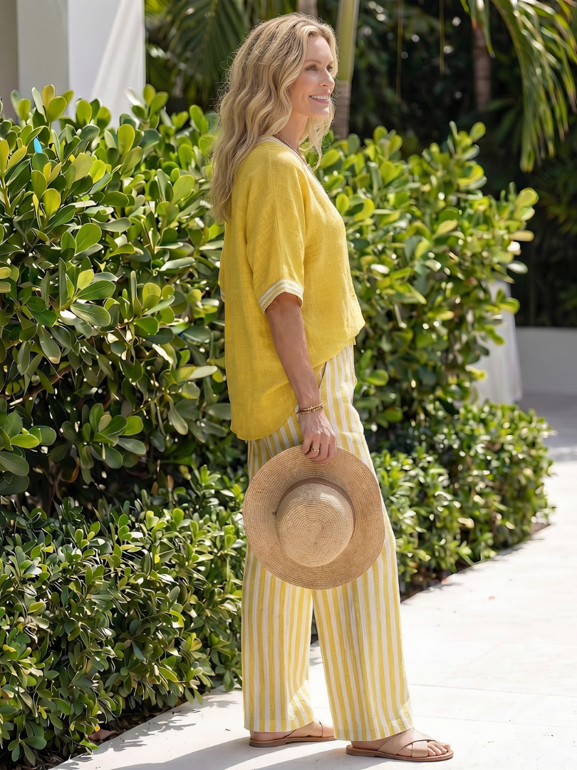 Veda Bremen Norma contrast V-neck tunic paired with striped pants set, featuring a stylish and comfortable casual outfit.