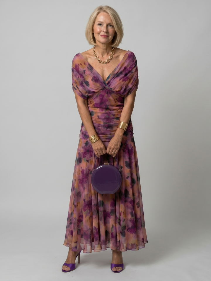 Veda Bremen Calen off-shoulder midi dress with flowing silhouette, soft fabric, and elegant mid-length design.