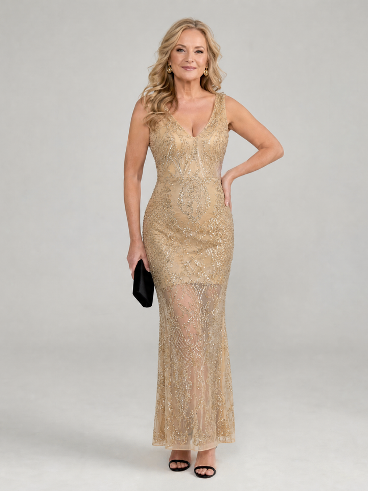 Veda Bremen Sirea sleeveless midi dress with sequins and sheer panel, elegant evening wear with shimmering details.