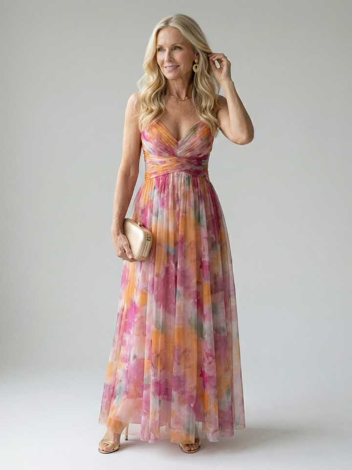 Veda Bremen Isel soft wrap maxi dress in lightweight fabric, shown in a flowing, elegant design with a V-neckline and long sleeves.