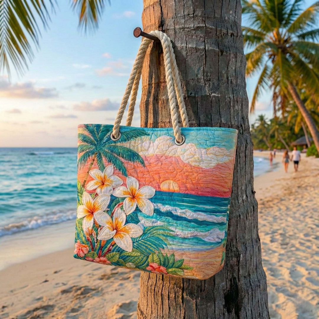 Veda Bremen Tropical Vibe quilted beach bag with tropical print, spacious straw-like handles, perfect for seaside outings.