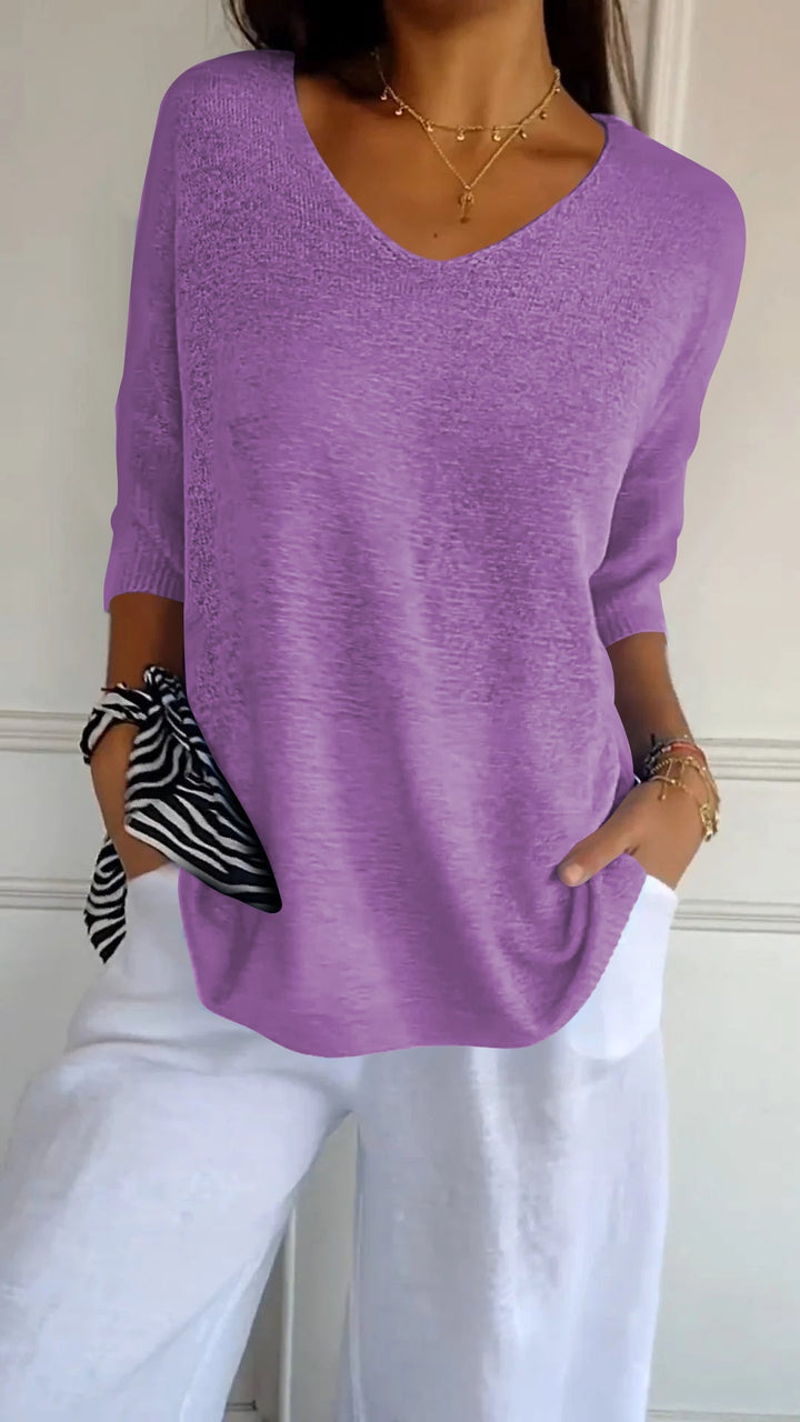 Veda Bremen Jill sleeveless V-neck top in soft fabric, shown in a close-up with a focus on the V-neckline and sleeveless design.