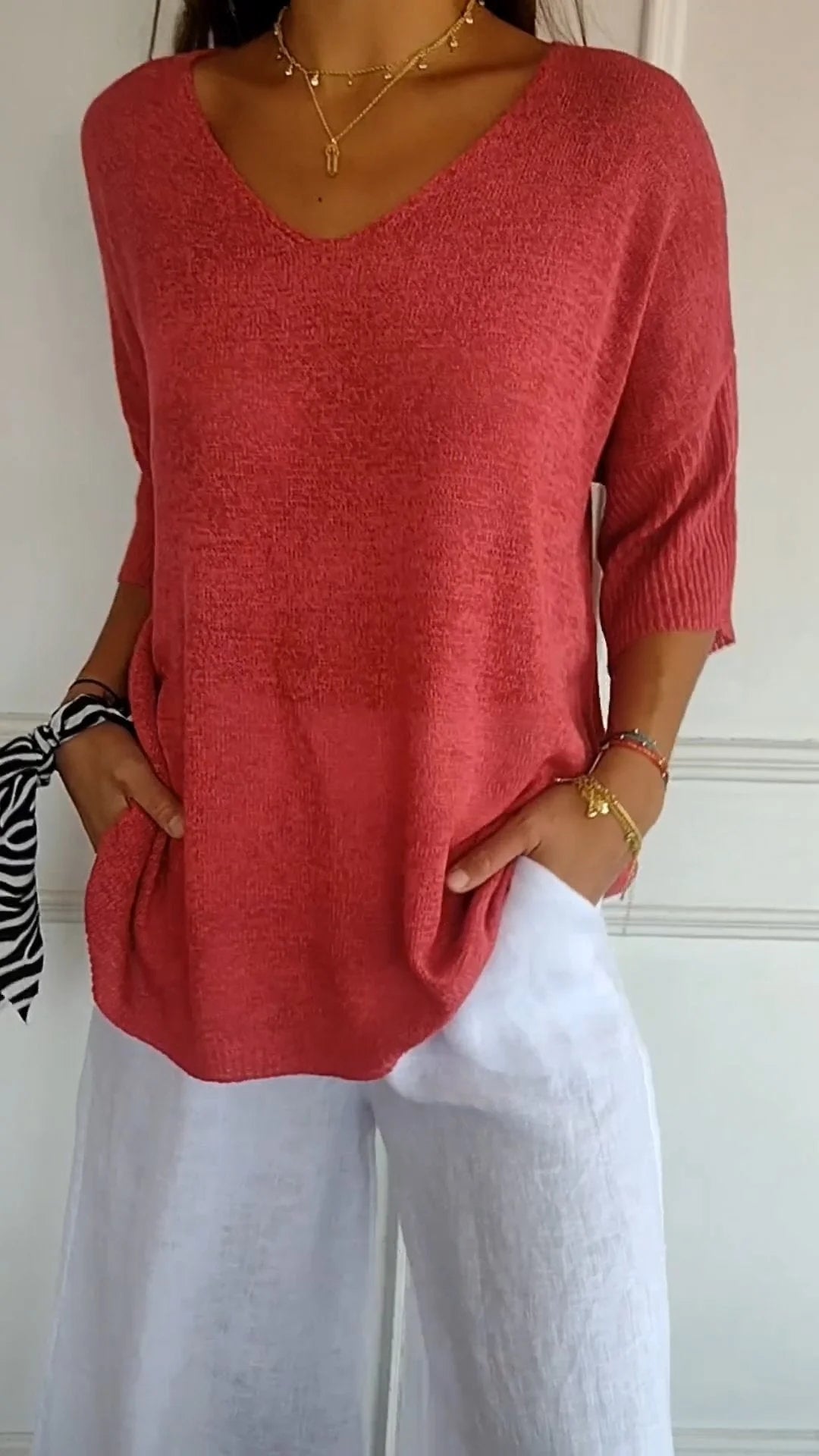 Veda Bremen Jill sleeveless V-neck top in soft fabric, light color, close-up showing neckline and sleeveless design.