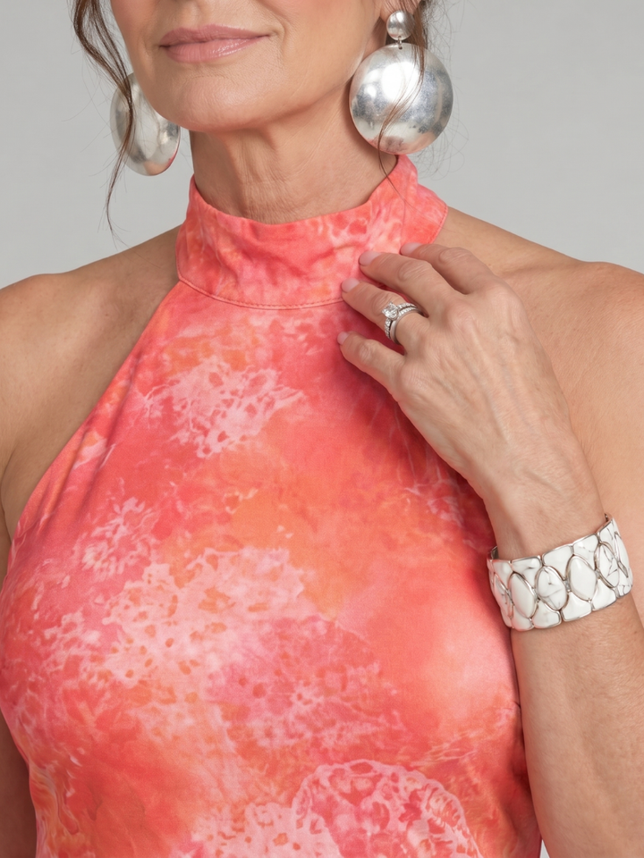 Veda Bremen Coraline maxi dress with neckholder and vibrant print pattern, flowing fabric, and stylish design.