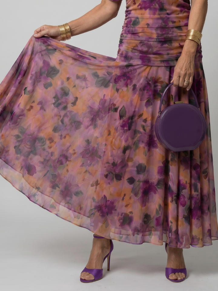Veda Bremen Calen off-shoulder midi dress with flowing fabric, featuring a relaxed fit and elegant design.