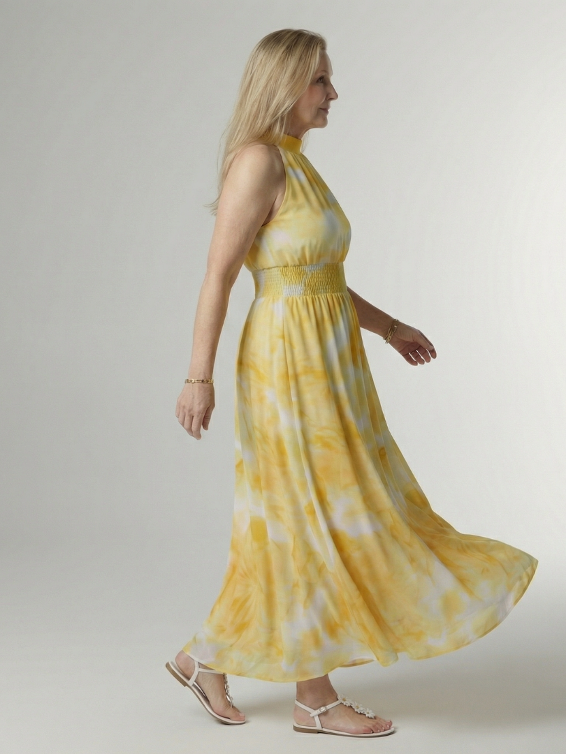Veda Bremen Sylin mid-length dress with halter neck, elegant and fitted, shown in a stylish, lightweight fabric.