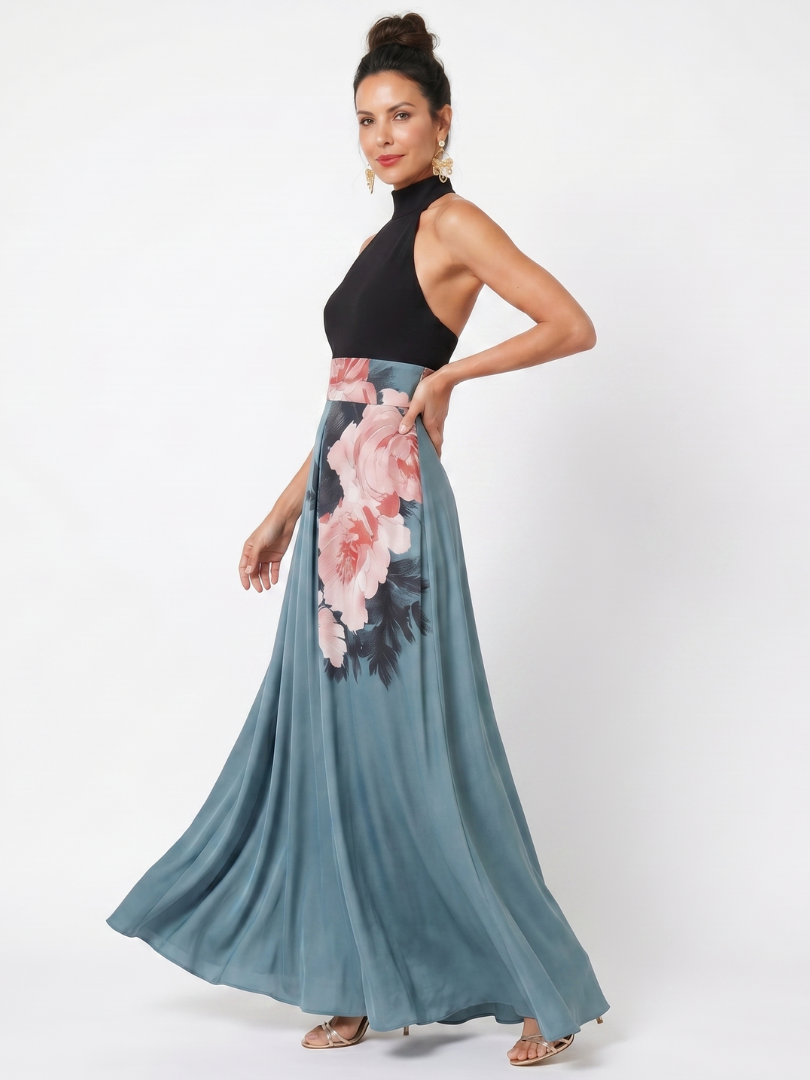 Veda Bremen Olympas maxikleid with neckholder top and floral skirt, featuring vibrant flower patterns and flowing fabric.