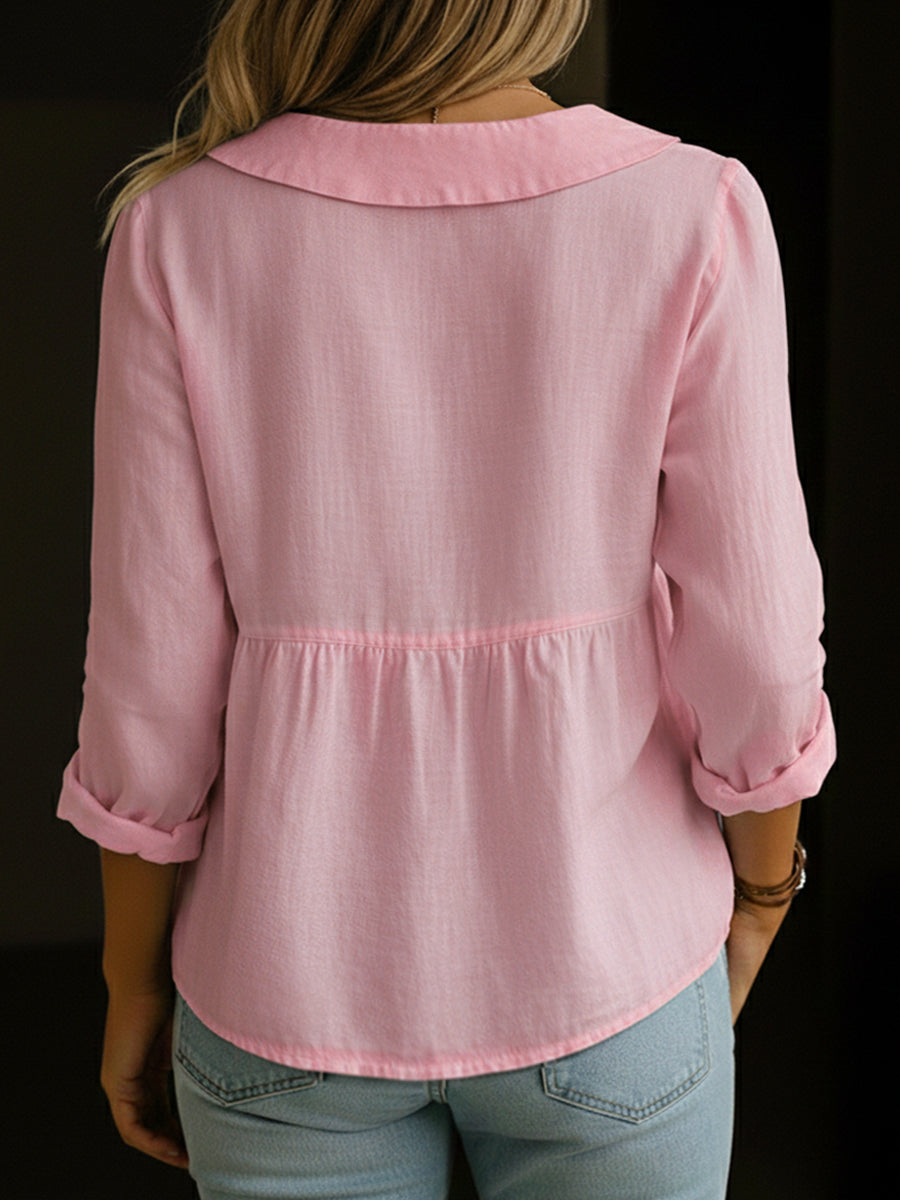 Veda Bremen Arlira linen blouse with Peter-Pan collar, soft textured fabric, long sleeves, and relaxed fit.