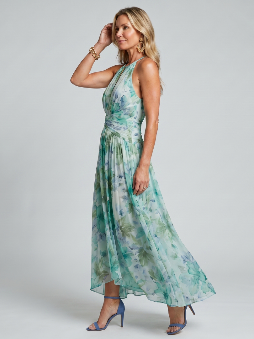 Veda Bremen Portia plissiertes Midikleid with neckholder and delicate floral pattern, showcasing soft pastel colors and flowing fabric.