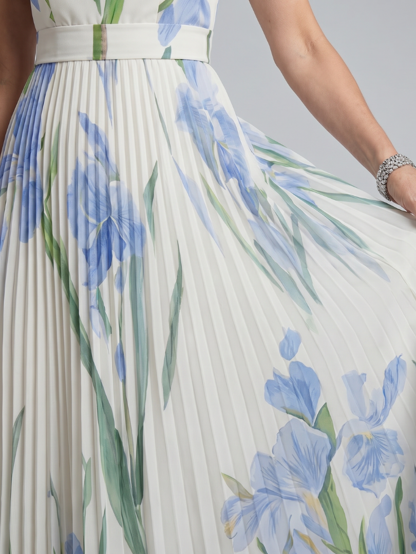Veda Bremen Ophelia sleeveless midi dress with square neckline and floral print, elegant summer dress on a model.
