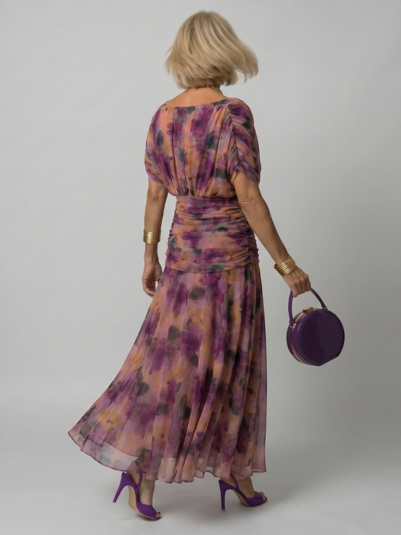 Veda Bremen Calen off-shoulder midikleid with flowing fabric and elegant silhouette, perfect for stylish occasions.
