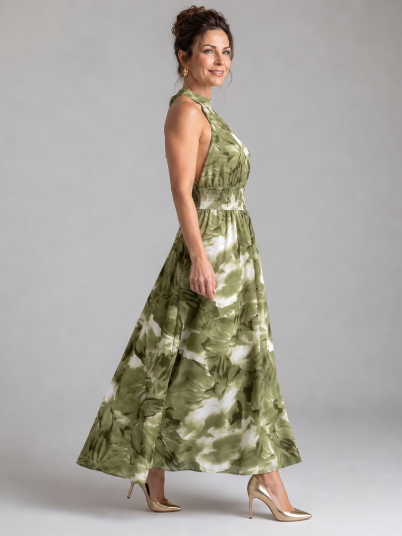 Veda Bremen Olivia midikleid with gathered waist and abstract print, showcasing its stylish design and flowing fabric.