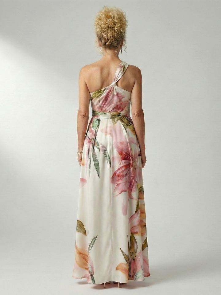Veda Bremen Amiel lightweight maxi dress with colorful floral print, flowing fabric, and sleeveless design for summer wear.