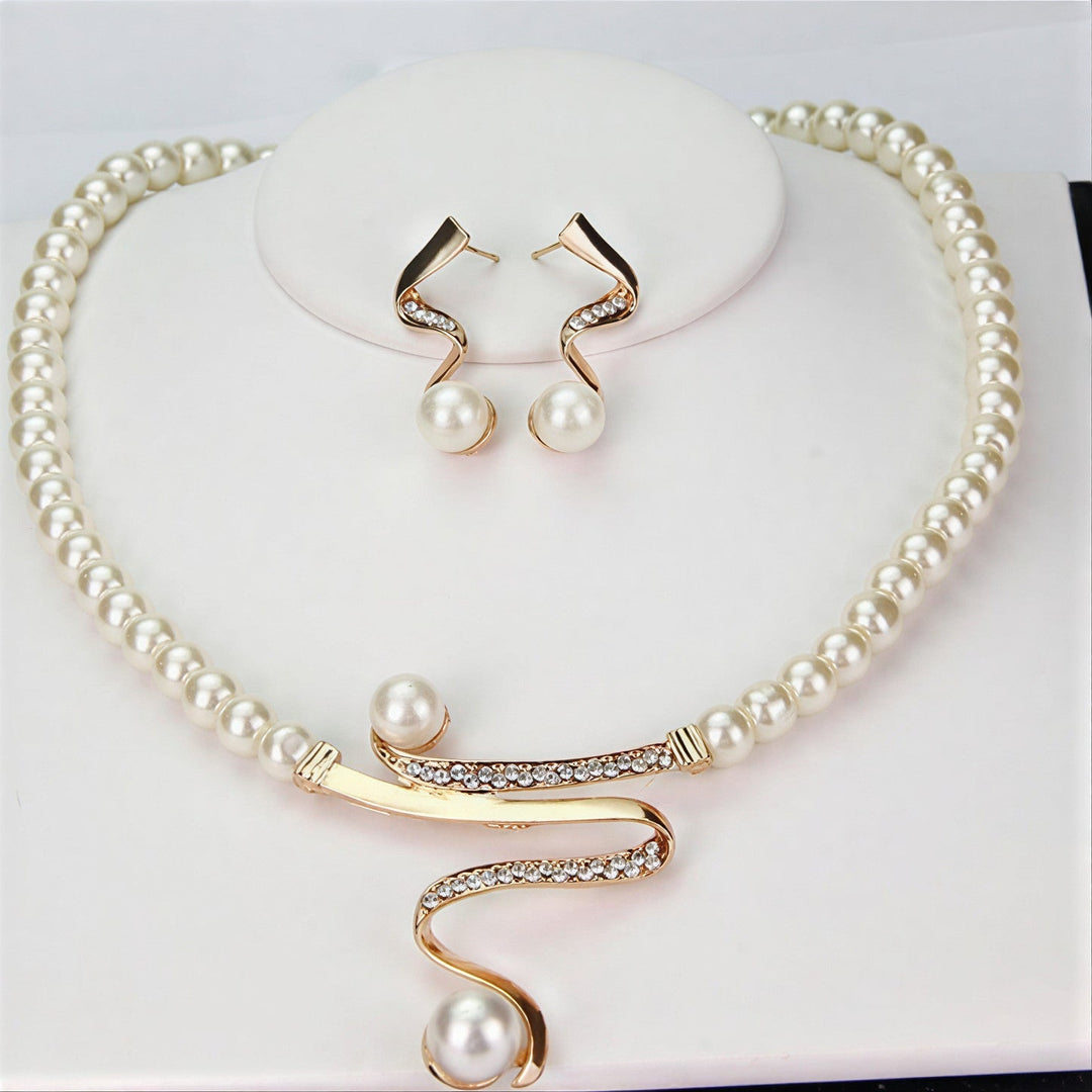 Veda Bremen Elegant Wave Pearl Jewellery Set featuring pearl earrings and necklace with wave-inspired design