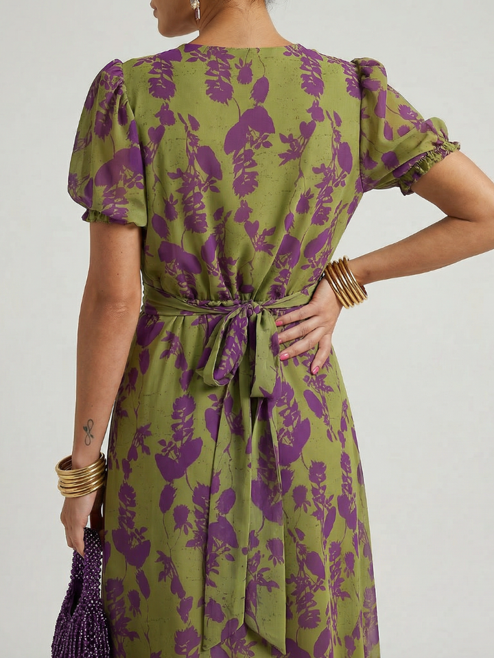 Vira Veda Bremen casual midi dress with a colorful floral print, featuring a relaxed fit and short sleeves.