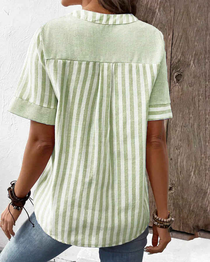 Veda Bremen Talia elegant striped blouse with long sleeves and a relaxed fit, shown in a close-up of the fabric and design.