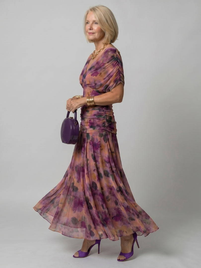 Veda Bremen Calen off-shoulder midi dress with flowing silhouette, styled on a model displaying elegant, casual summer fashion.
