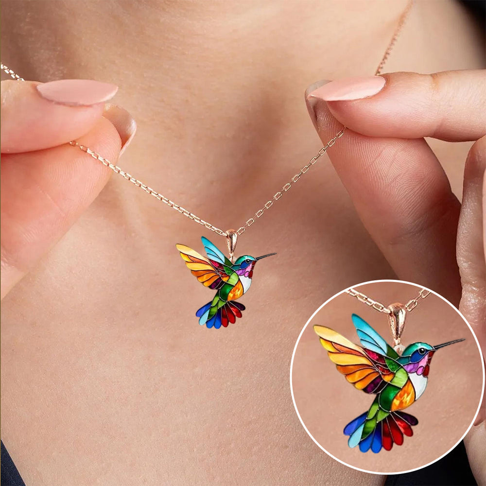 Veda Bremen Kolibri necklace with matching earrings, delicate gold-tone jewelry featuring a hummingbird design, elegant and charming.
