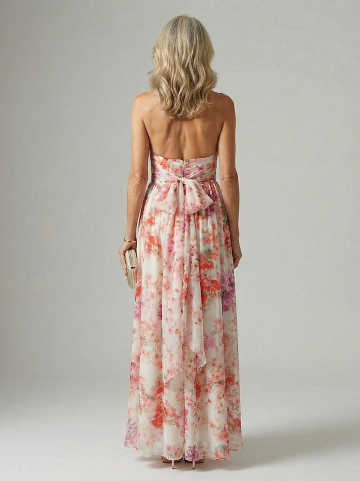Veda Bremen Elyon flowing maxi dress in lightweight fabric, shown in soft pastel color with a relaxed fit and elegant drape.