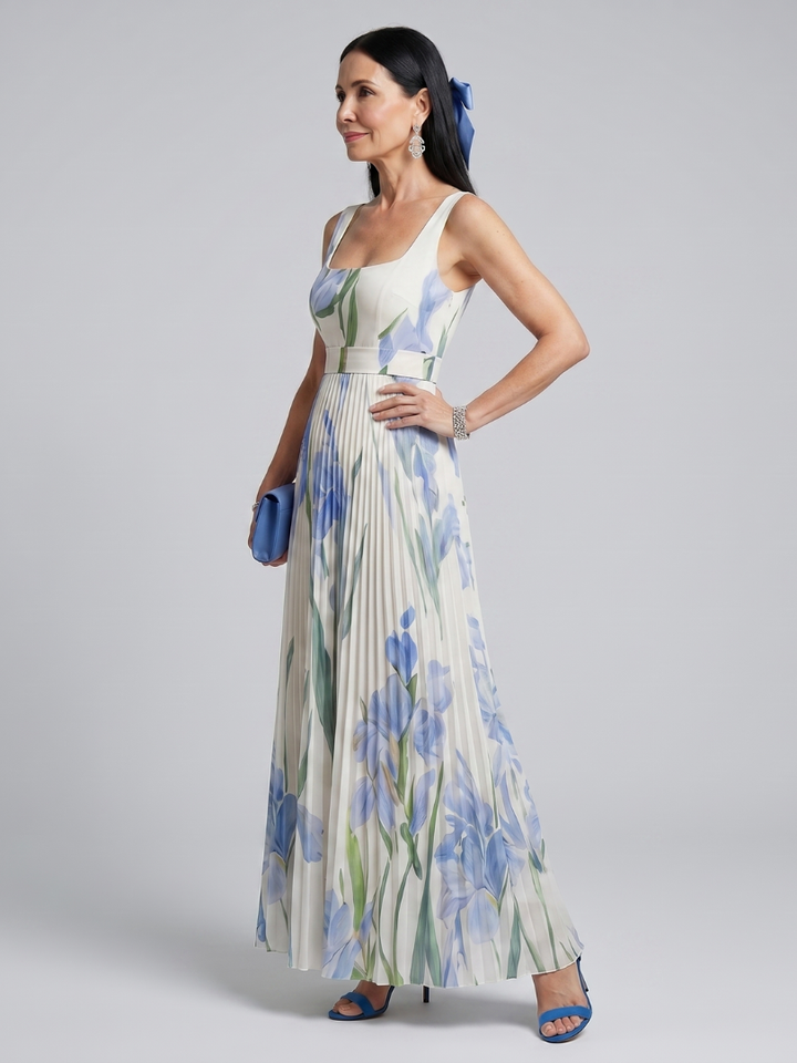 Veda Bremen Ophelia sleeveless midi dress with square neckline and floral print, showcasing its elegant design and vibrant pattern.
