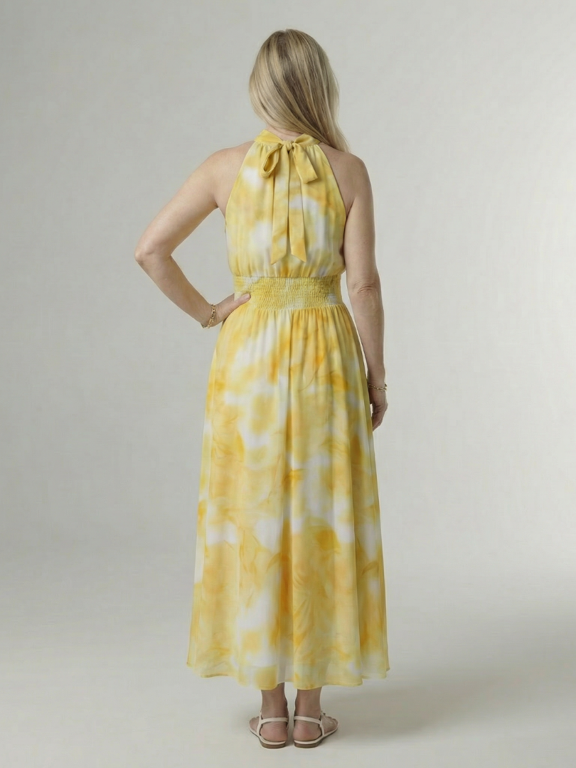 Veda Bremen Sylin Gerafftes Midikleid mit Neckholder, elegant midi dress with ruffles and a halter neckline, displayed on a hanger.