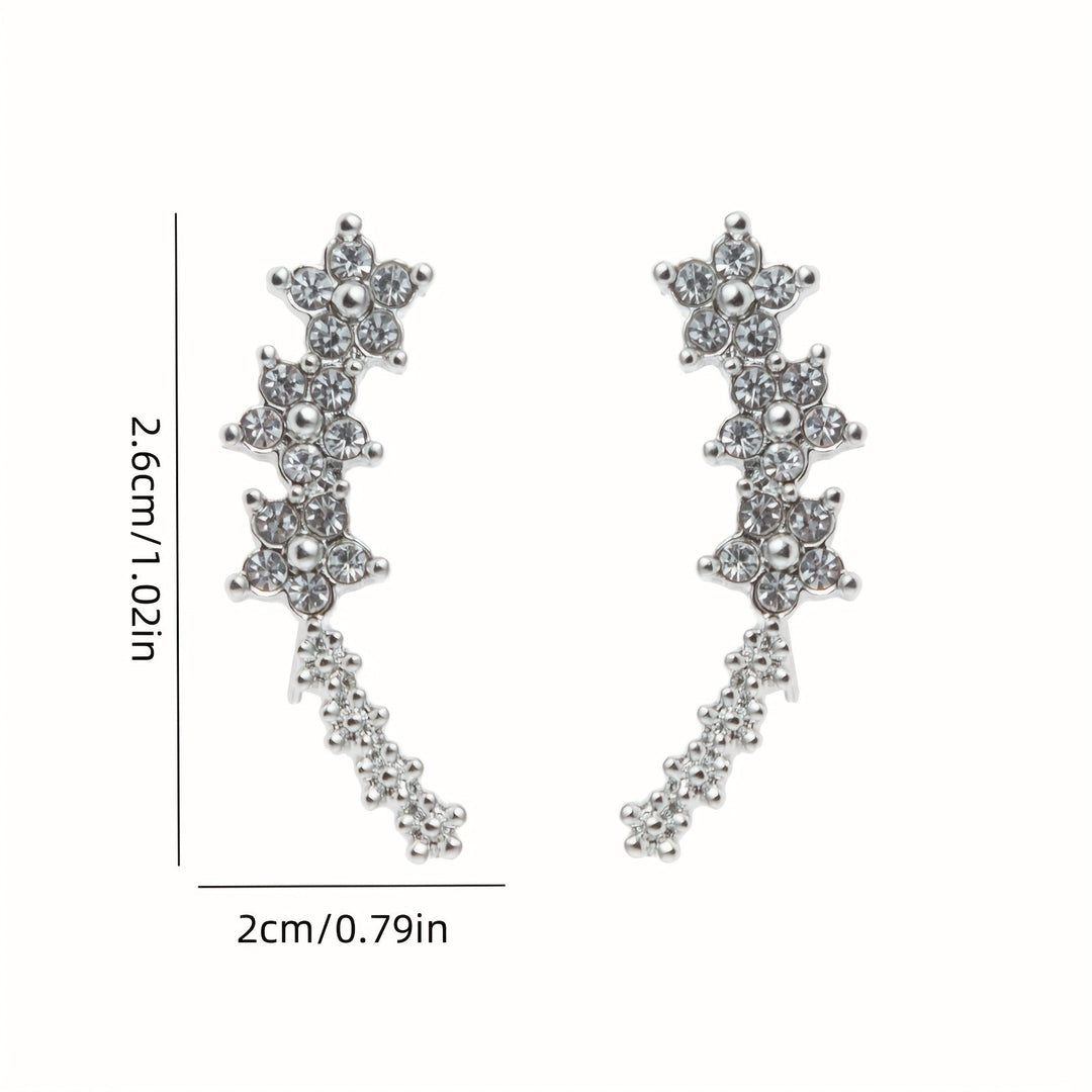 Veda Bremen zeitlose Blumen Ohrringe with delicate floral design and gold-tone finish, hanging earrings for elegant style.