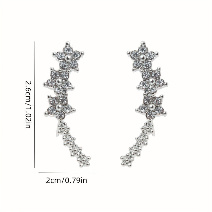 Veda Bremen zeitlose Blumen Ohrringe with delicate floral design and gold-tone finish, hanging earrings for elegant style.