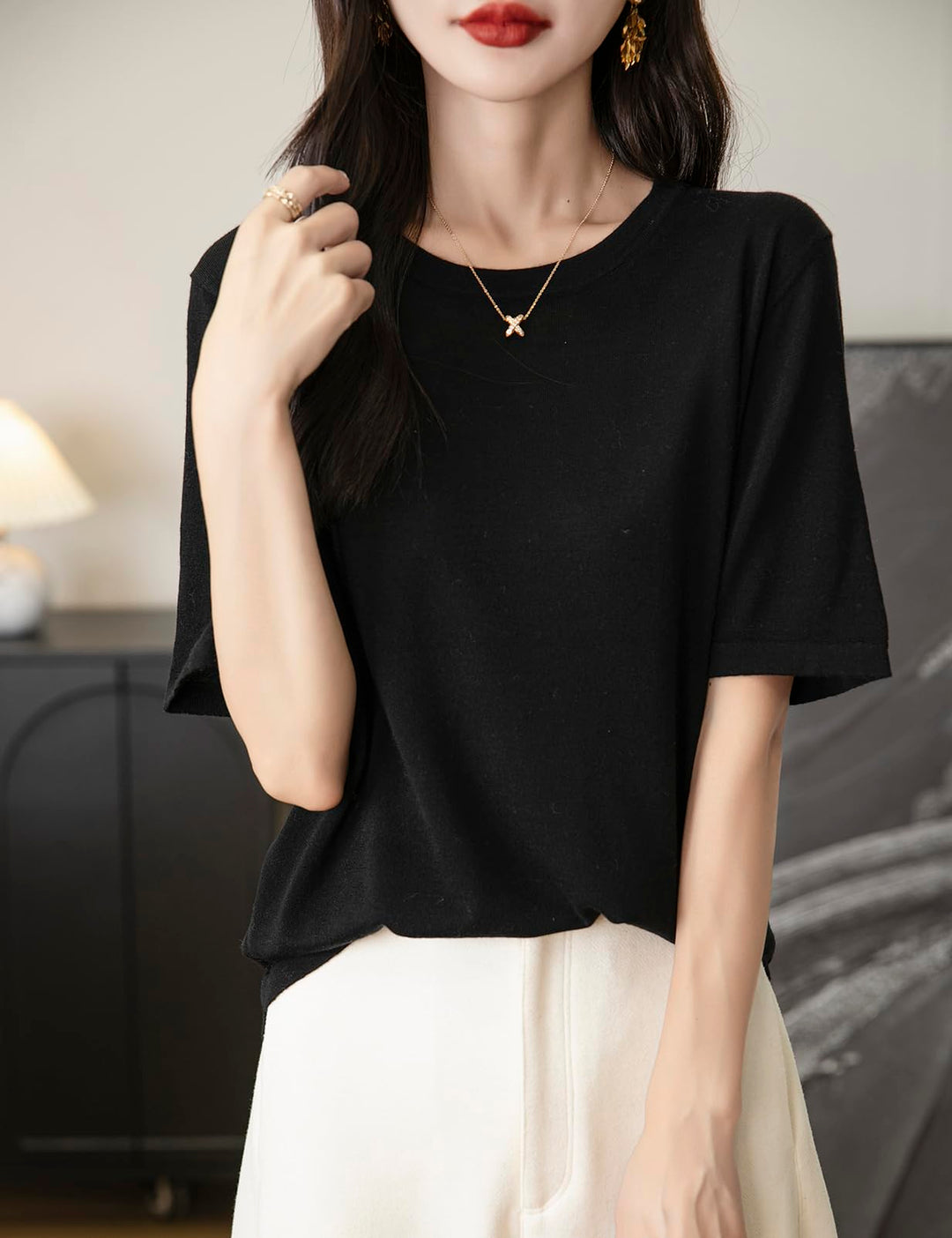 Veda Bremen 100% Merino Wool crew neck tee shirt in natural wool, close-up of soft, lightweight fabric and classic design.