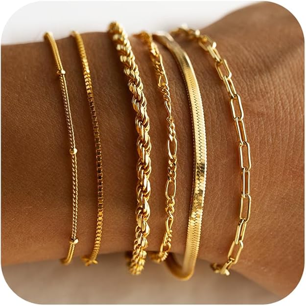 Veda Bremen Isabella Vernetta bracelet set in gold featuring multiple stylish bangles on a white background.