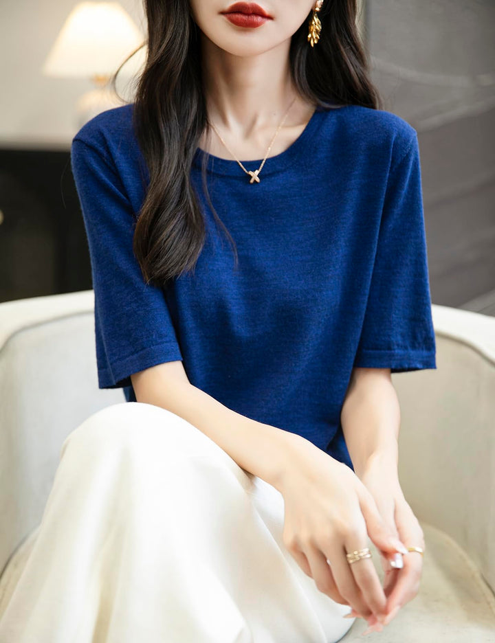 Veda Bremen 100% Merino Wool crew neck T-shirt in neutral color, close-up showing soft fabric and classic fit.