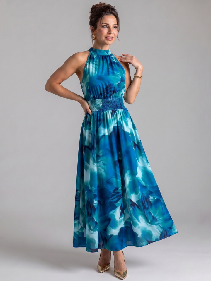 Veda Bremen Olivia midikleid with gathered waistband and abstract print, showcasing stylish, flowy dress design.