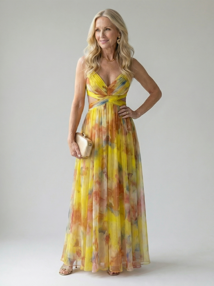 Veda Bremen Isel soft wrap maxi dress in a flowing fabric, featuring a relaxed fit and elegant drape, displayed on a hanger.