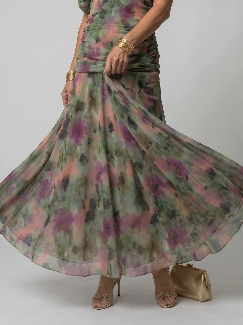 Veda Bremen Calen off-shoulder midi dress with flowing silhouette, worn by a model showcasing the elegant, relaxed fit.