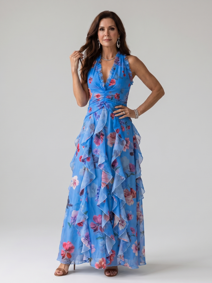Veda Bremen Nori maxi dress with neckholder, gathered bodice, and floral print, featuring a flowing silhouette.