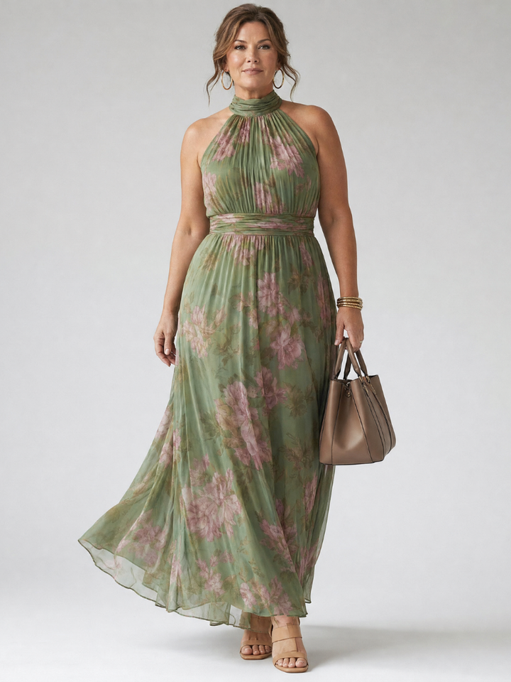 Veda Bremen Mirelle mid-length dress with ruffled details and halter neckline, shown in a stylish, flowing fabric.