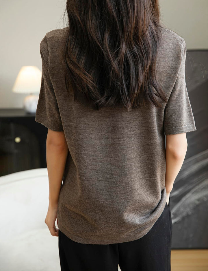Veda Bremen 100% Merino Wool crew neck tee shirt, soft and warm, shown in natural wool color with close-up of fabric texture.