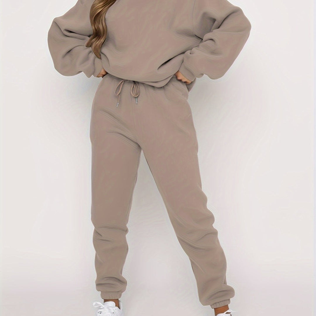 LuroLondon The Simple Two-Piece set featuring a sleek top and matching bottoms in neutral fabric.
