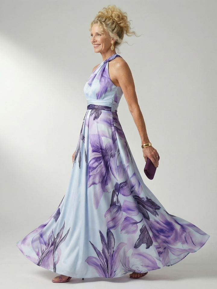Veda Bremen Amiel lightweight maxi dress with vibrant floral print, flowing fabric and sleeveless design.