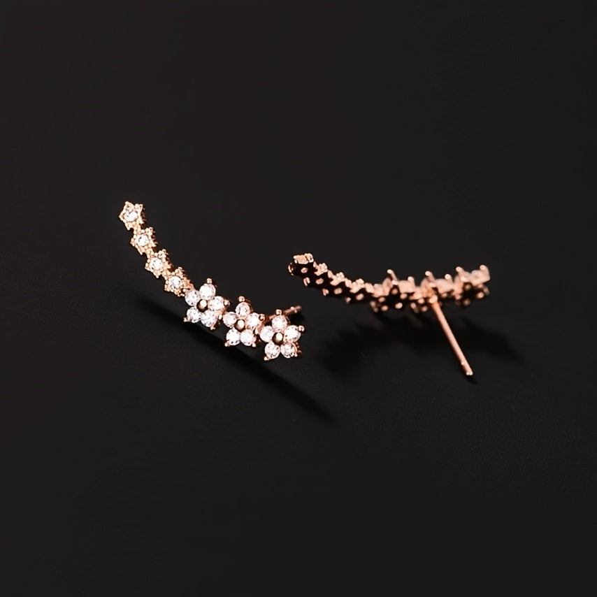 Veda Bremen timeless flower earrings featuring delicate floral design in gold-tone metal with intricate detailing.