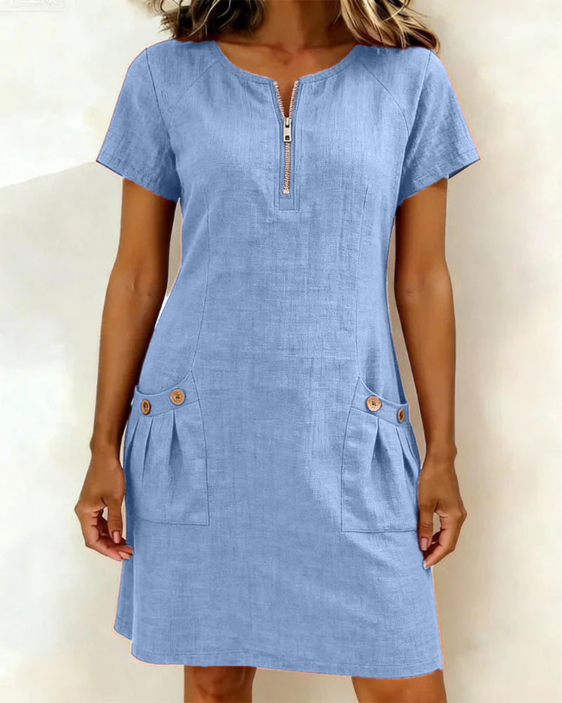 Veda Bremen Dariae linen-blend A-line dress in a soft, flowing style, displayed on a hanger with a neutral background.