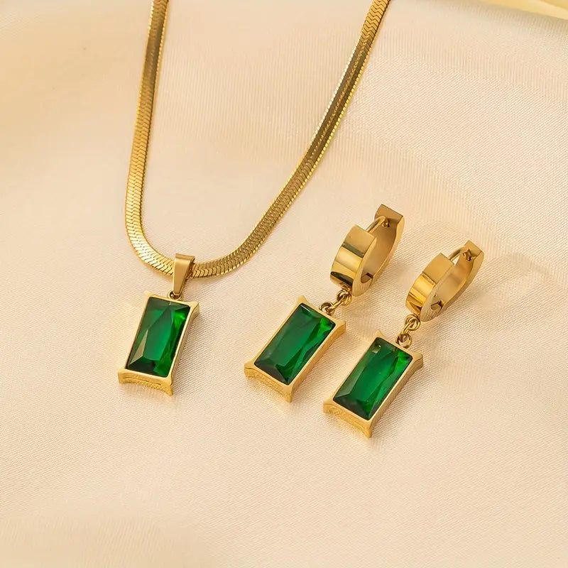 Veda Bremen Iselotte Verdain gold jewelry set featuring necklace and matching earrings with elegant design.