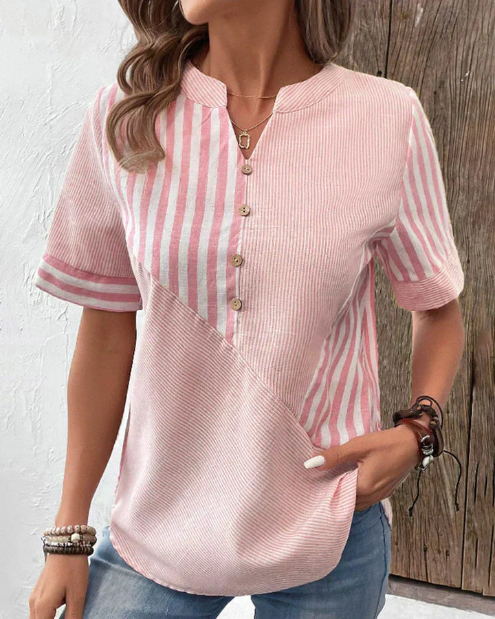 Veda Bremen Talia elegant striped blouse with long sleeves and classic collar, shown on a hanger against a neutral background.