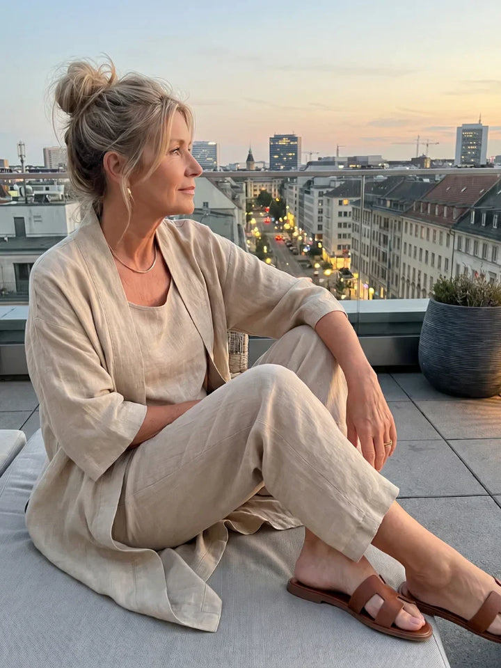 Veda Bremen Linnea lightweight linen set displayed on a hanger with soft, natural fabric and neutral tones.