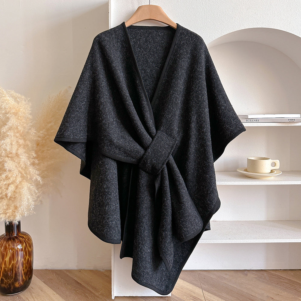 Black Pancho by Lurolondon.co.uk, stylish and versatile umbrella with a sleek design, perfect for rainy weather.
